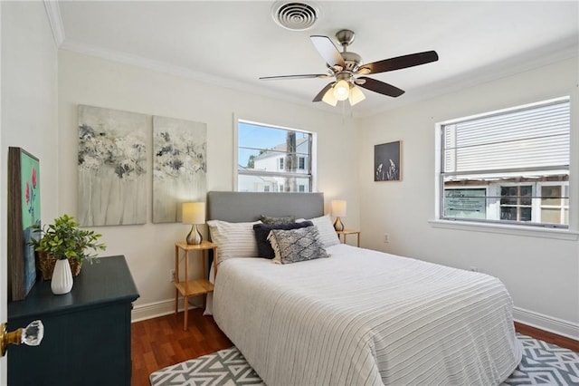 4 Virginia Ct, New Orleans, LA 70124 - bedroom featuring wood finished floors, crown molding, baseboards, and a ceiling fan