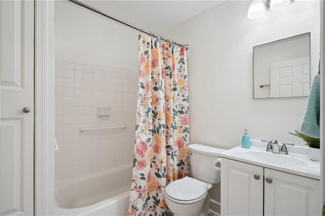 4 Virginia Ct, New Orleans, LA 70124 - full bathroom featuring toilet, shower / bath combo with shower curtain, and vanity