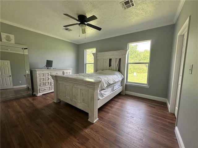 24473 Timbercrest Dr, Franklinton, LA 70438 - bedroom with dark wood-type flooring, baseboards, a textured ceiling, crown molding, and ceiling fan
