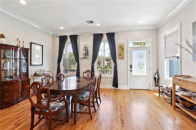 1723 N Broad St, New Orleans, LA 70119 - dining area with light wood finished floors, ornamental molding, baseboards, and recessed lighting