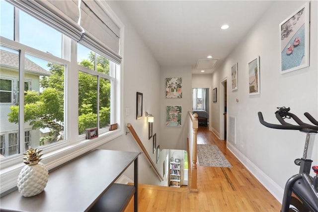 1723 N Broad St, New Orleans, LA 70119 - hallway featuring an upstairs landing, light wood-style flooring, attic access, recessed lighting, and baseboards