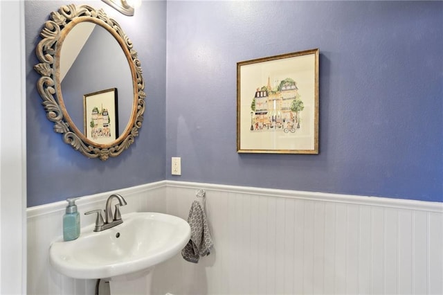 1723 N Broad St, New Orleans, LA 70119 - bathroom with a sink and a wainscoted wall