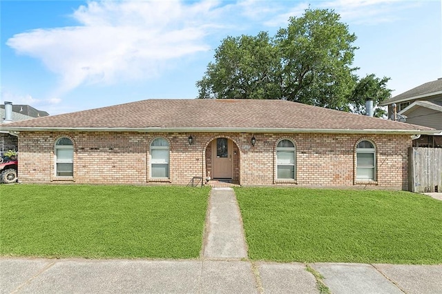 2713 Legend St, Meraux, LA 70075 - ranch-style house featuring a shingled roof and brick siding