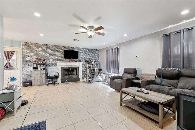 2713 Legend St, Meraux, LA 70075 - living room featuring ceiling fan, light tile patterned flooring, a brick fireplace, and recessed lighting