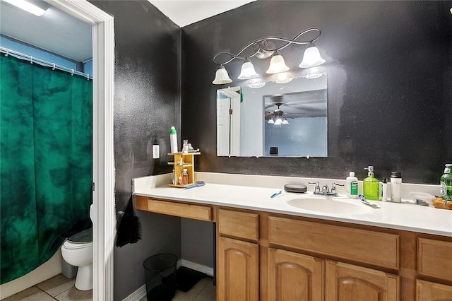 2713 Legend St, Meraux, LA 70075 - full bathroom featuring tile patterned flooring, vanity, toilet, a ceiling fan, and a shower with shower curtain