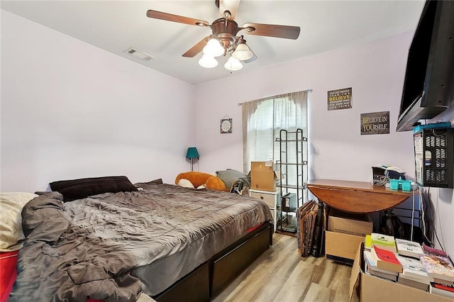 2713 Legend St, Meraux, LA 70075 - bedroom featuring light wood finished floors and a ceiling fan