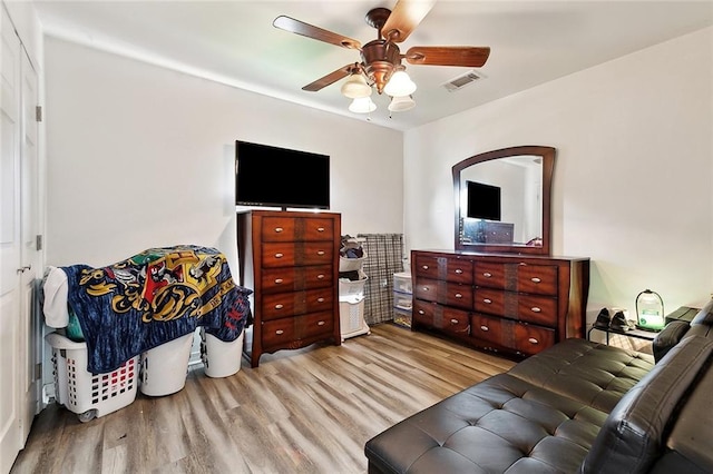 2713 Legend St, Meraux, LA 70075 - bedroom with light wood-style flooring and a ceiling fan