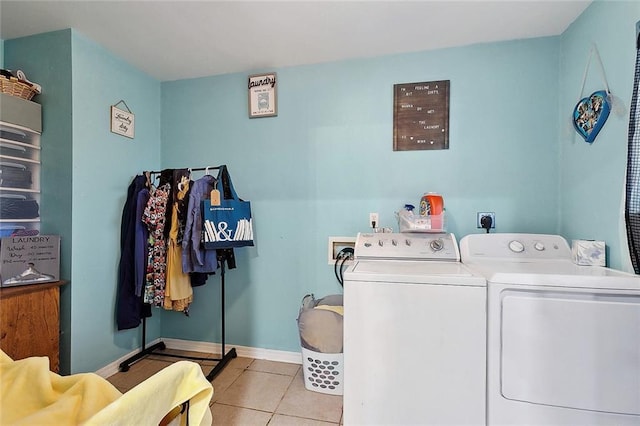 2713 Legend St, Meraux, LA 70075 - clothes washing area with separate washer and dryer, tile patterned floors, and baseboards