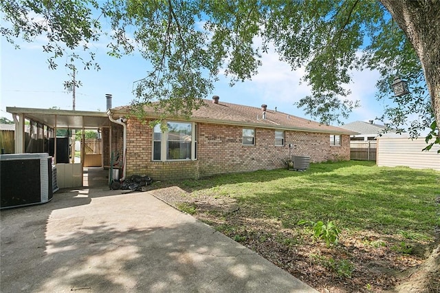 2713 Legend St, Meraux, LA 70075 - back of house with cooling unit and brick siding