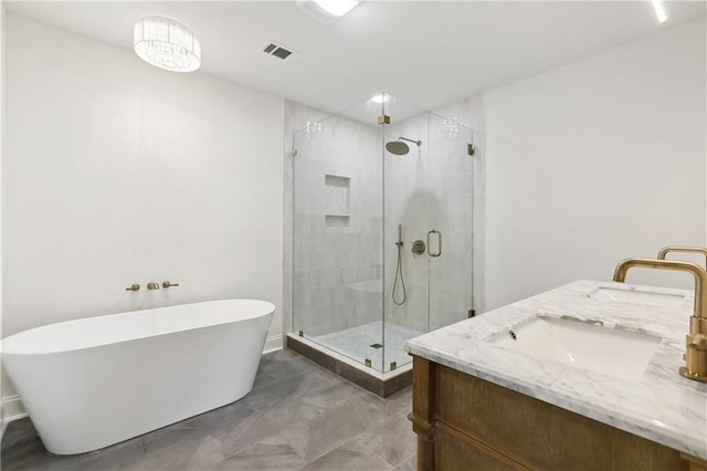 4412 Camel St, Metairie, LA 70001 - full bath featuring a shower stall, a freestanding tub, marble look tiles, double vanity, and baseboards