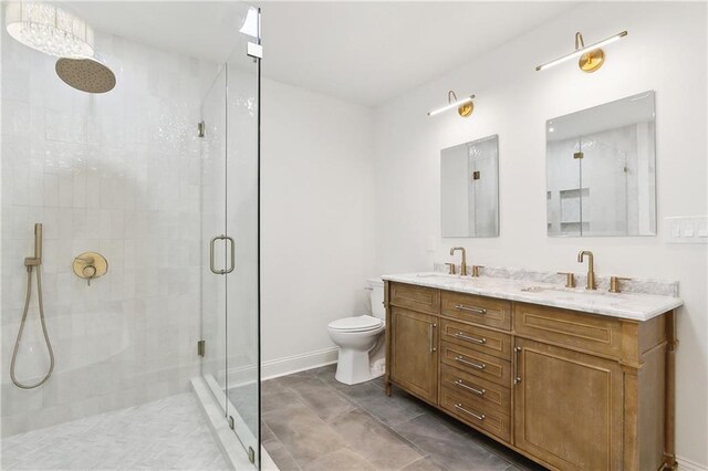 4412 Camel St, Metairie, LA 70001 - bathroom featuring a stall shower, toilet, double vanity, and baseboards