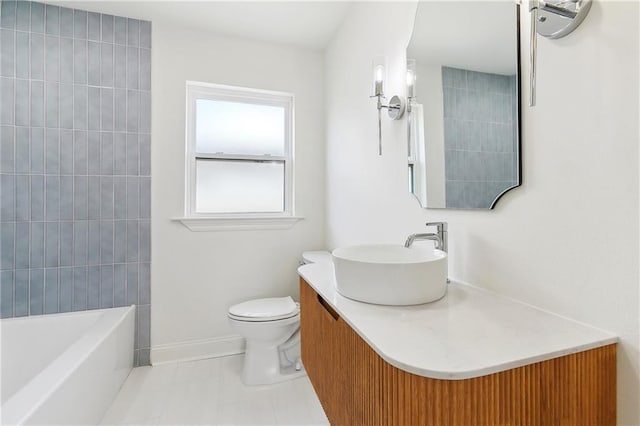 4412 Camel St, Metairie, LA 70001 - full bath featuring toilet, vanity, baseboards, and tile patterned floors