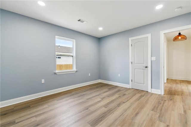 4412 Camel St, Metairie, LA 70001 - unfurnished room featuring wood finished floors, baseboards, a smoke detector, and recessed lighting