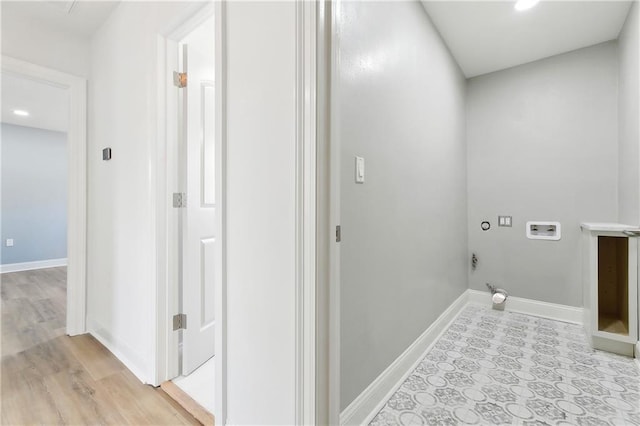 4412 Camel St, Metairie, LA 70001 - laundry area with hookup for a washing machine, electric dryer hookup, baseboards, and light wood finished floors