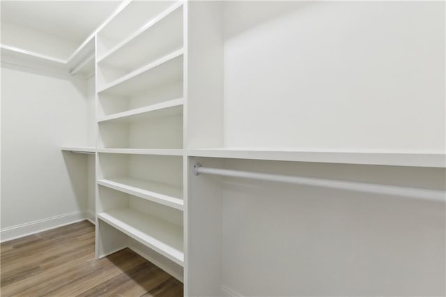 4412 Camel St, Metairie, LA 70001 - spacious closet featuring wood finished floors