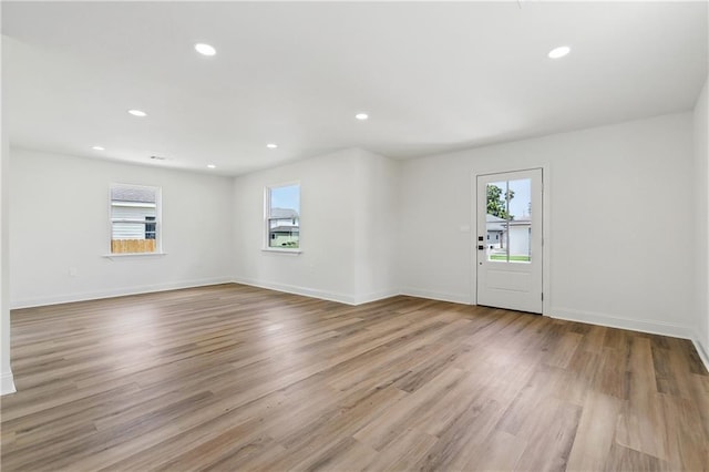 4412 Camel St, Metairie, LA 70001 - spare room featuring healthy amount of natural light, wood finished floors, recessed lighting, and baseboards
