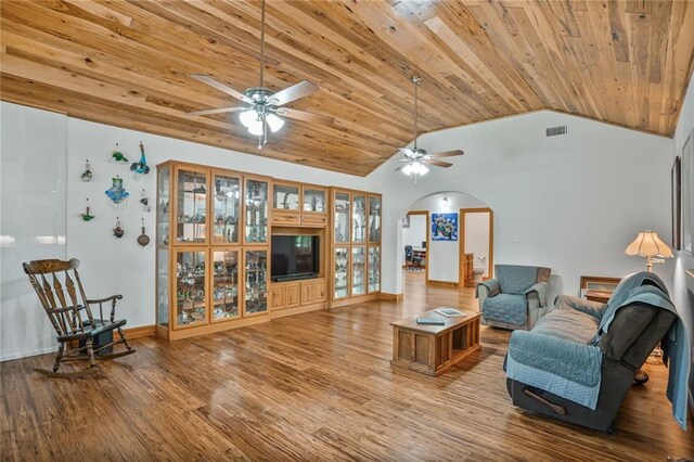 25506 Cardinal Ct, Bush, LA 70431 - living room with arched walkways, wooden ceiling, lofted ceiling, a ceiling fan, and wood finished floors
