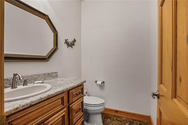 25506 Cardinal Ct, Bush, LA 70431 - half bath featuring vanity, toilet, and baseboards