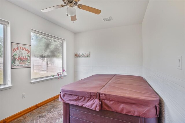 25506 Cardinal Ct, Bush, LA 70431 - bedroom with baseboards and ceiling fan