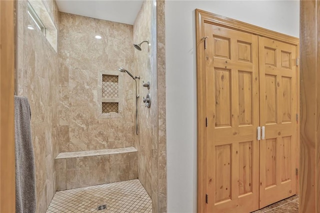 25506 Cardinal Ct, Bush, LA 70431 - bathroom with tiled shower and tile patterned floors