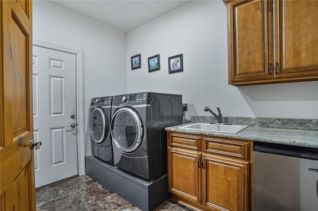 25506 Cardinal Ct, Bush, LA 70431 - clothes washing area with separate washer and dryer, cabinet space, and dark stone finish flooring
