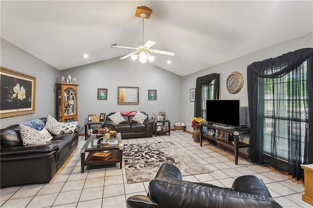 41357 Countryside Ln, Hammond, LA 70403 - living room featuring lofted ceiling, light tile patterned floors, ceiling fan, and baseboards
