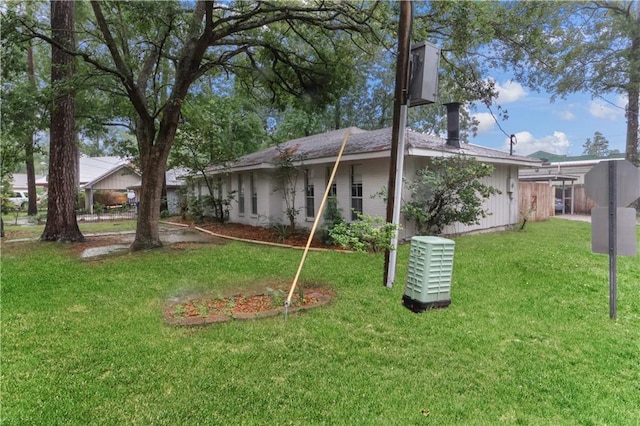 154 Oakwood Dr, Mandeville, LA 70448 - view of front of property with a front lawn