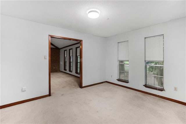 154 Oakwood Dr, Mandeville, LA 70448 - unfurnished room featuring light carpet and baseboards