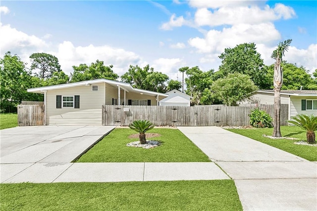 1931 Farmington Pl, Terrytown, LA 70056 - mid-century inspired home with concrete driveway and a gate