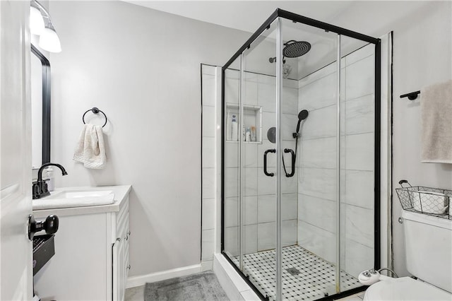 1931 Farmington Pl, Terrytown, LA 70056 - full bath featuring a stall shower, vanity, toilet, and baseboards