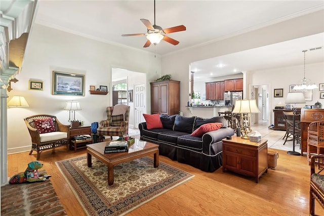 505 Swift Fox Run, Madisonville, LA 70447 - living room featuring ceiling fan, ornamental molding, light wood-style floors, and recessed lighting