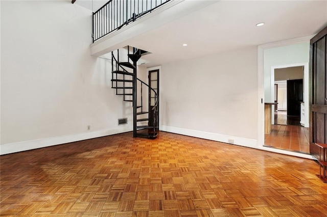 724 Constantinople St, New Orleans, LA 70115 - unfurnished living room featuring stairway and recessed lighting