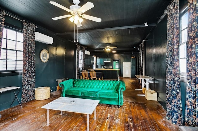 613 Pacific Ave, New Orleans, LA 70114 - living room with ceiling fan, a wall mounted AC, and hardwood / wood-style flooring