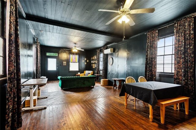 613 Pacific Ave, New Orleans, LA 70114 - living area featuring ceiling fan, hardwood / wood-style floors, an AC wall unit, and wood ceiling