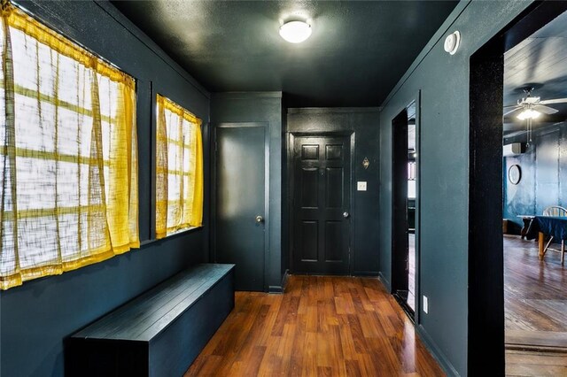 613 Pacific Ave, New Orleans, LA 70114 - entryway featuring wood finished floors and ceiling fan