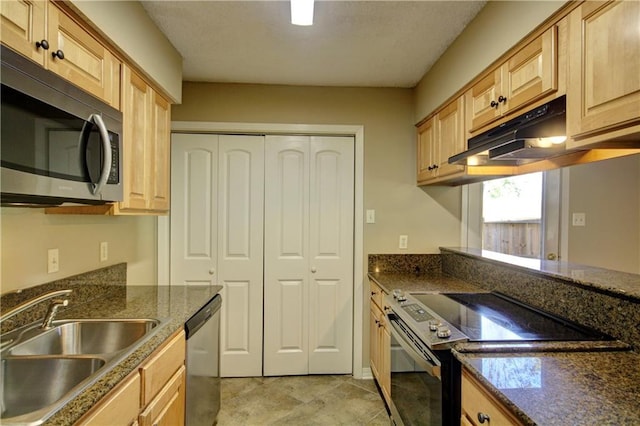717 Heavens Dr Unit 4, Mandeville, LA 70471 - kitchen with appliances with stainless steel finishes, a sink, under cabinet range hood, and light brown cabinets