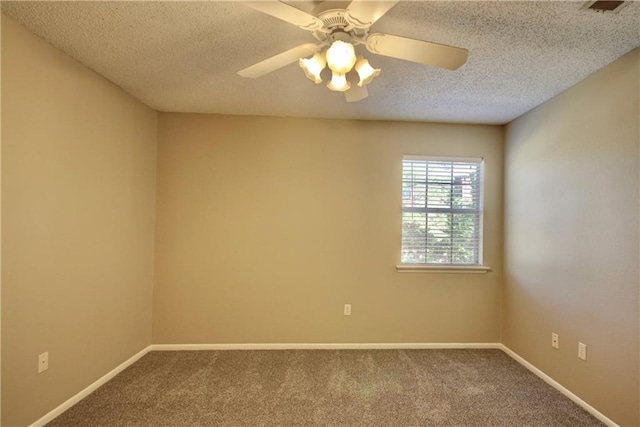 717 Heavens Dr Unit 4, Mandeville, LA 70471 - carpeted spare room featuring a textured ceiling, ceiling fan, and baseboards