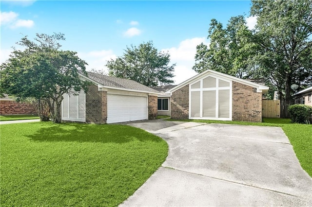 301 Holmes Dr, Slidell, LA 70460 - view of front facade with brick siding, an attached garage, and driveway