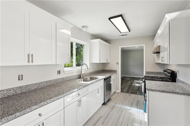 301 Holmes Dr, Slidell, LA 70460 - kitchen featuring stainless steel electric stove, a sink, dishwasher, white cabinetry, and light stone counters