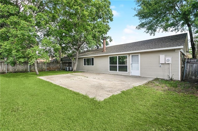 301 Holmes Dr, Slidell, LA 70460 - rear view of house featuring a patio, cooling unit, and roof with shingles