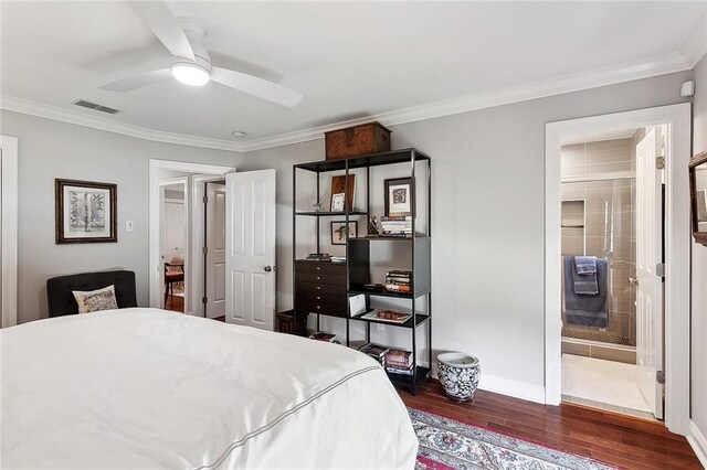 3928 Uri St, Metairie, LA 70002 - bedroom featuring wood finished floors, crown molding, and baseboards