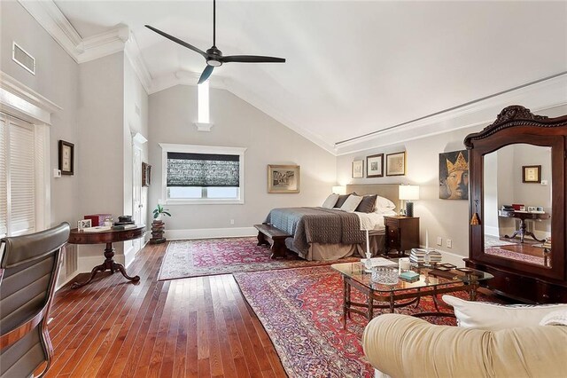 3928 Uri St, Metairie, LA 70002 - bedroom with crown molding, hardwood / wood-style flooring, baseboards, vaulted ceiling, and a ceiling fan