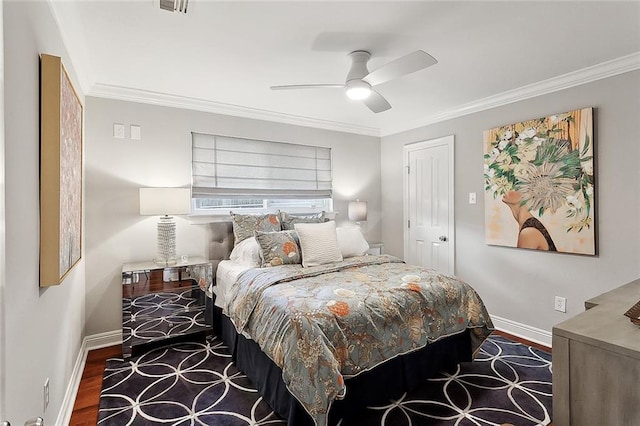 3928 Uri St, Metairie, LA 70002 - bedroom featuring baseboards, wood finished floors, ornamental molding, and ceiling fan