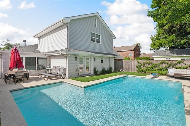 3928 Uri St, Metairie, LA 70002 - view of pool with a fenced backyard, french doors, and a patio area