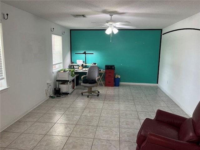242 Willow Dr, Gretna, LA 70053 - office area featuring ceiling fan, light tile patterned floors, and baseboards