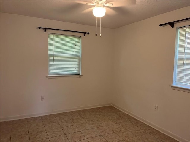 242 Willow Dr, Gretna, LA 70053 - spare room with ceiling fan, baseboards, and light tile patterned floors