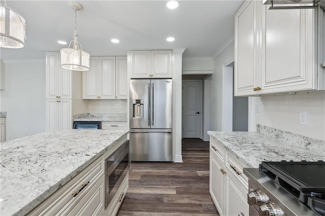 4233 Bordeaux Dr, Kenner, LA 70065 - kitchen with appliances with stainless steel finishes, crown molding, dark wood-type flooring, white cabinetry, and recessed lighting
