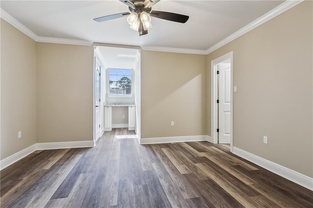4233 Bordeaux Dr, Kenner, LA 70065 - spare room featuring a ceiling fan, dark wood-style floors, crown molding, and baseboards