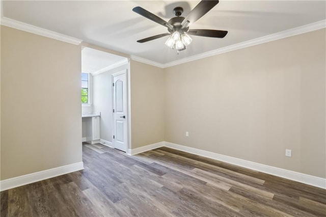4233 Bordeaux Dr, Kenner, LA 70065 - empty room featuring dark wood-type flooring, ornamental molding, a ceiling fan, and baseboards