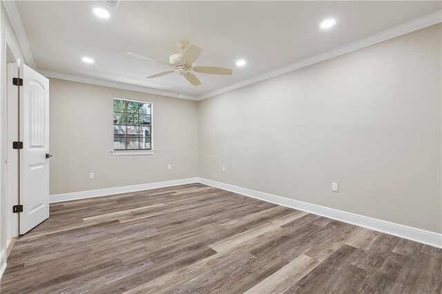 4233 Bordeaux Dr, Kenner, LA 70065 - empty room featuring crown molding, wood finished floors, ceiling fan, baseboards, and recessed lighting